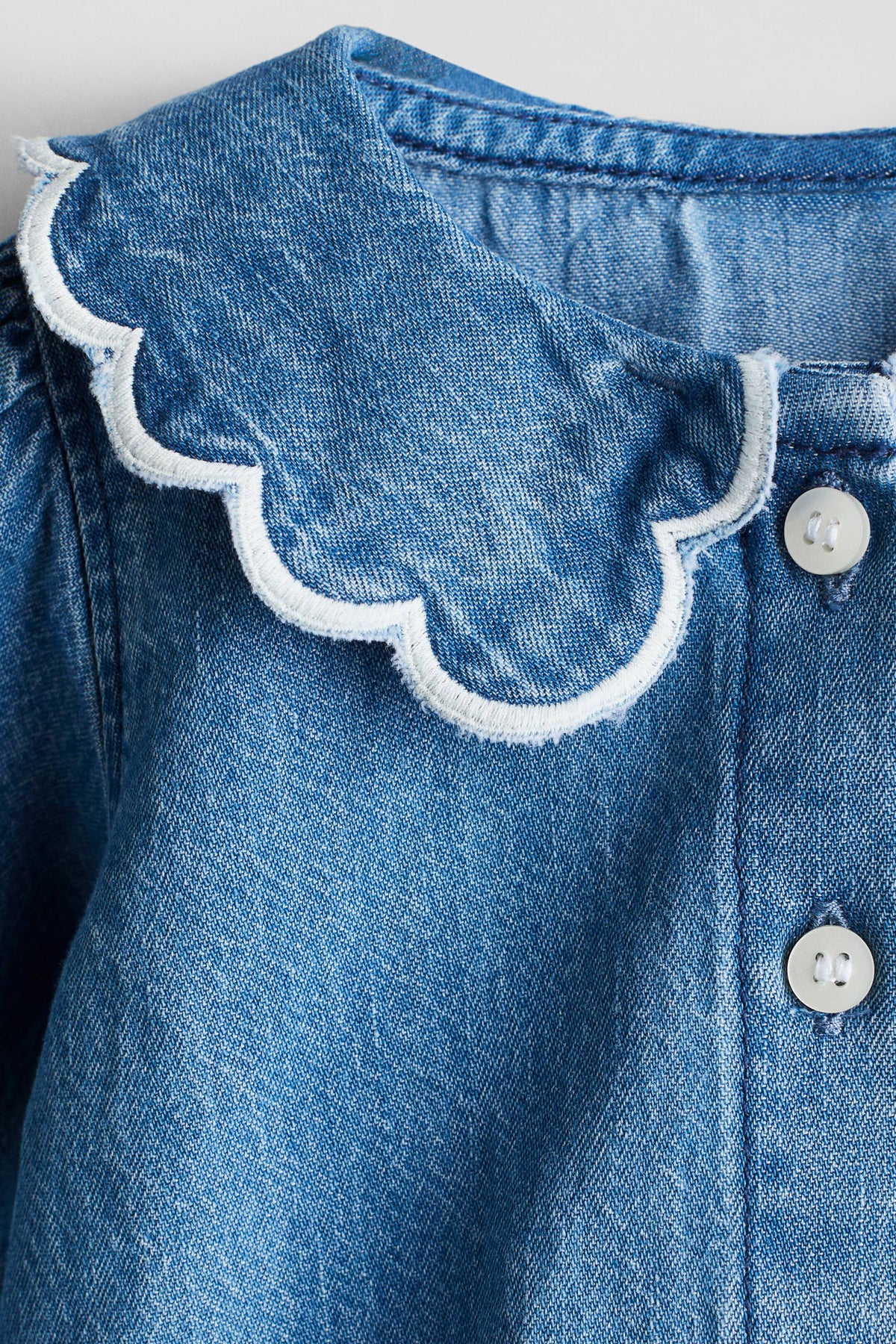 Scalloped denim blouse